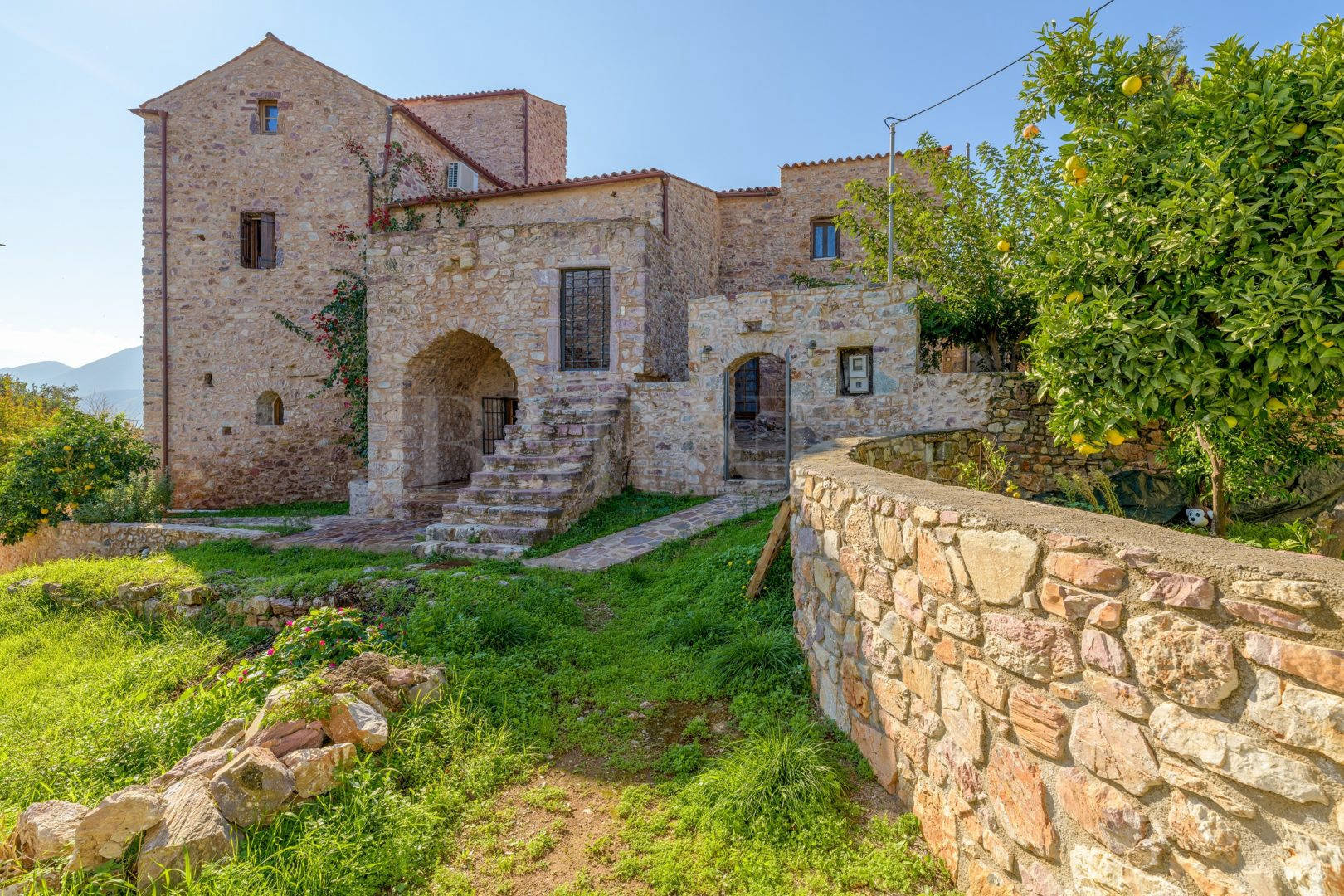 Renovated stone tower in a Mani village  - SoSKT709