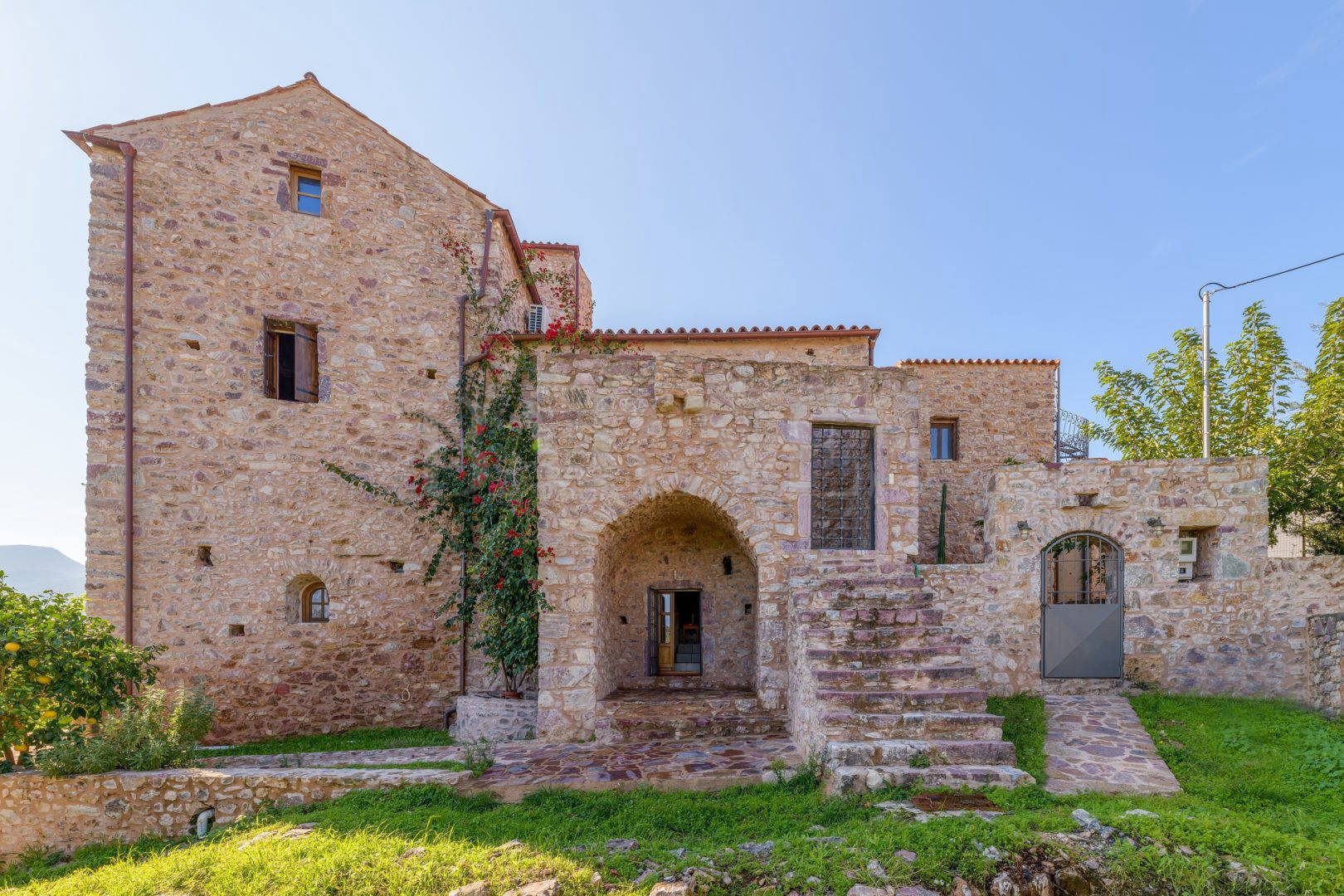 Renovated stone tower in a Mani village  - SoSKT709