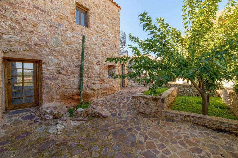 Renovated stone tower in a Mani village  - SoSKT709