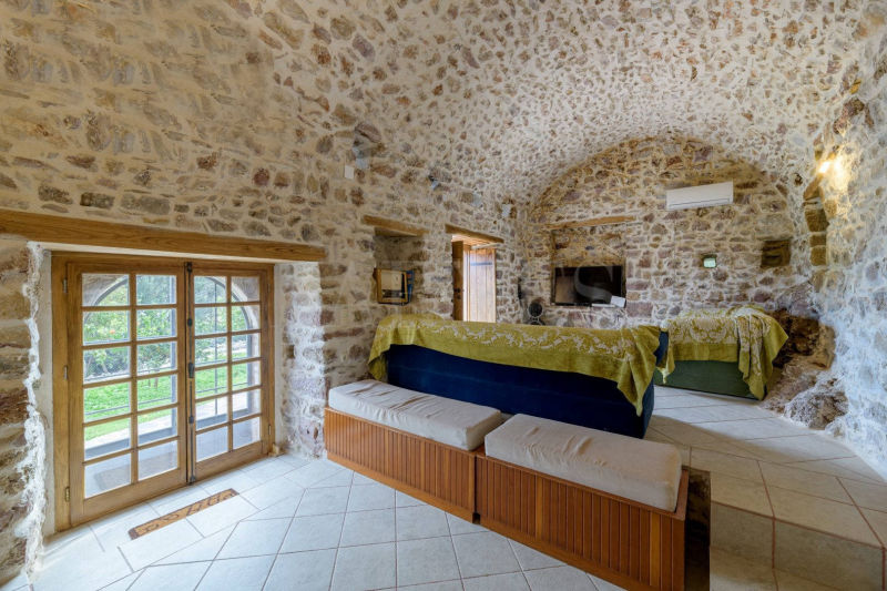 Renovated stone tower in a Mani village  - SoSKT709