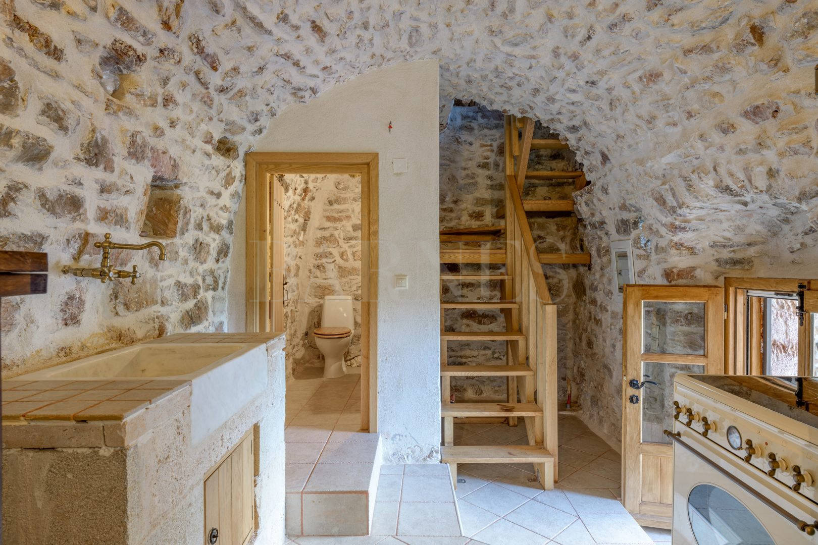Renovated stone tower in a mountain village  - SoSKT709
