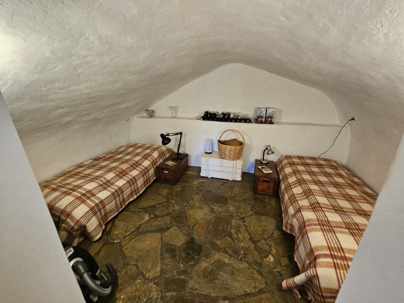 The second bedroom on the ground floor of the renovated house