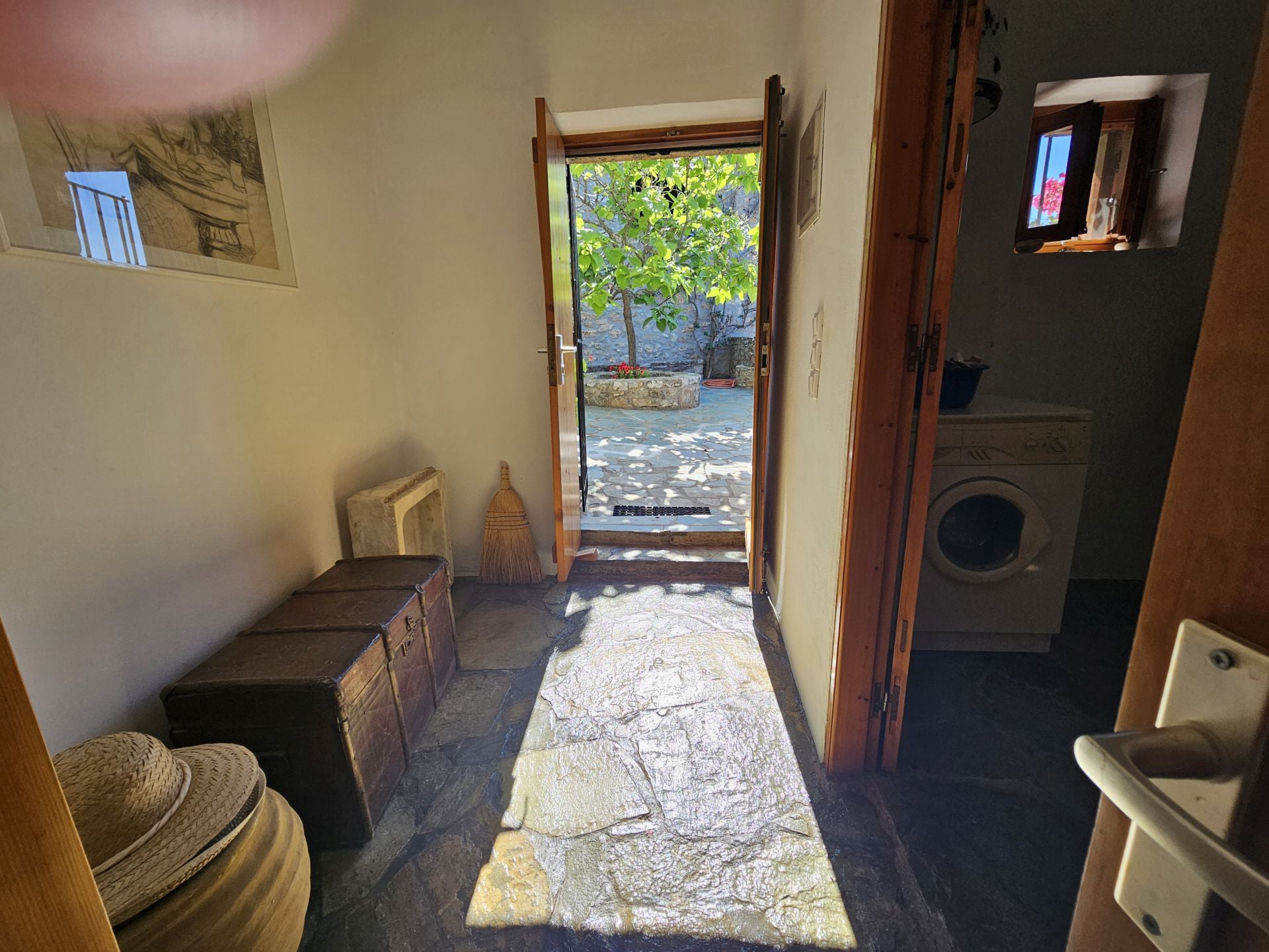The entrance door to the ground floor of the renovated house