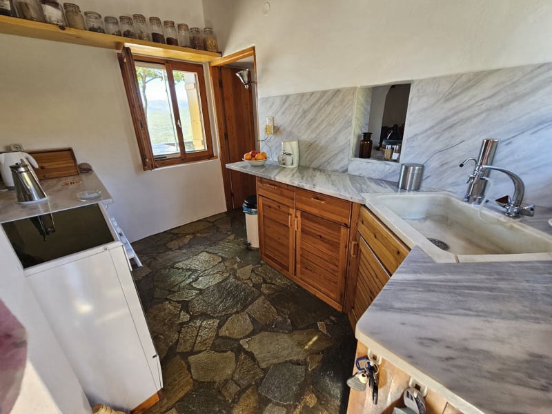 The kitchen on the upper floor of the renovated house