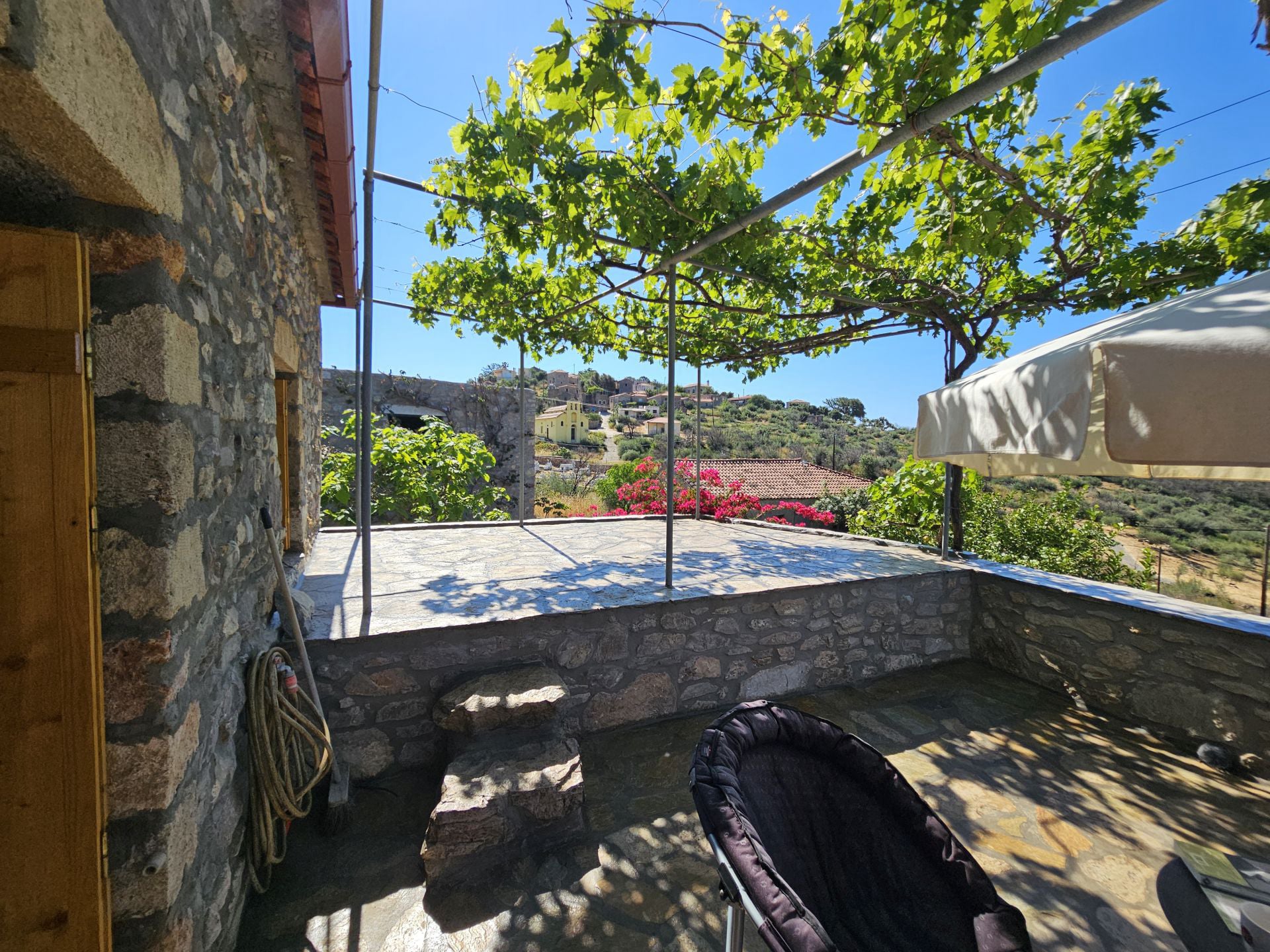 The terrace on the upper floor of the renovated house