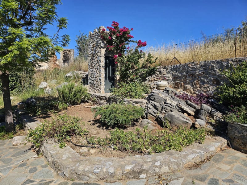 The beautiful garden with store tower within the garden behind of the houses